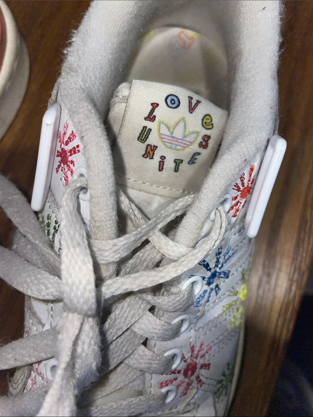 Adidas love unites Pride sneakers